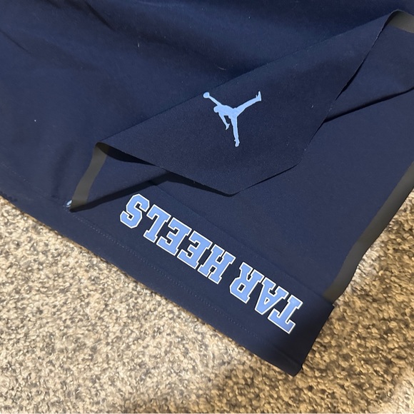 UNC team issued performance shorts, Pockets with zippers. - Picture 2 of 2